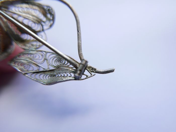 Vintage silver filigree flower brooch