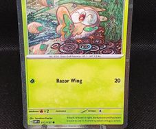 Rowlet Cosmo Holo Pokemon Card