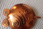 Copper brooch