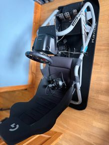 Logitech G edition sim seat with PlayStation wheel, pressure sensitive pedals and gear stick