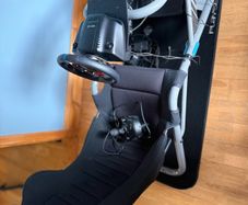 Logitech G edition sim seat with PlayStation wheel, pressure sensitive pedals and gear stick