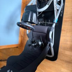 Logitech G edition sim seat with PlayStation wheel, pressure sensitive pedals and gear stick