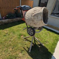 Petrol cement mixer with stand