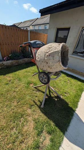 Petrol cement mixer with stand