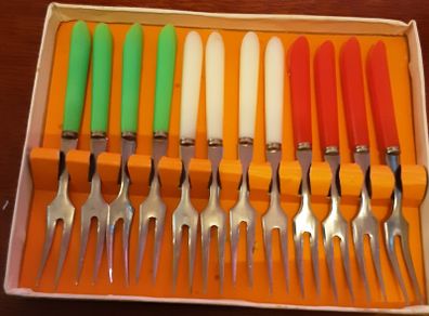 one dozen boxed vintage little forks