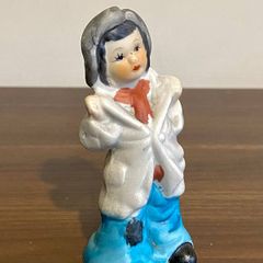 Vintage Bisque Figurine Of a Boy in Oversized Clothes