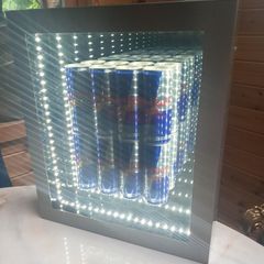 Red Bull mirror art with lighting,