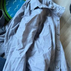 6 grey school shirts, 2 grey trousers, 1 black shoes