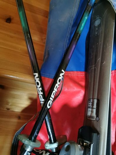 Atomic skis, gipron poles and storage bag
