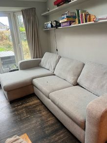 L shaped couch with double fold up bed