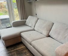 L shaped couch with double fold up bed