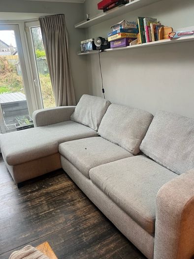 L shaped couch with double fold up bed