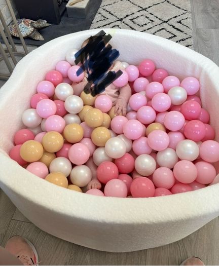 Luxury cream bouche ball pit with pink, white and gold balls