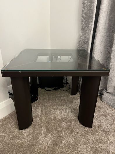 Square Glass coffe table with brown leather upholstery