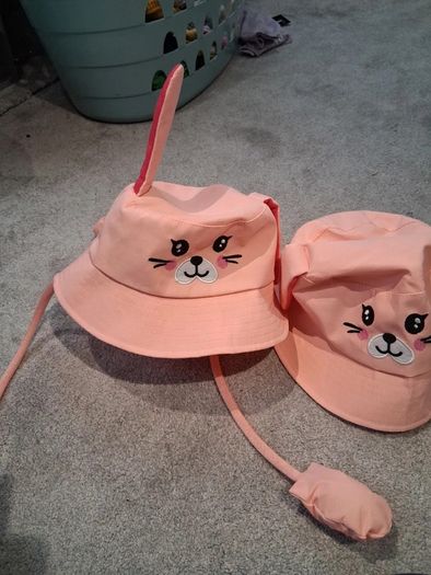 Two Brand New with tags 'Press my paws to move my ears' Sun hats both Age 7-9 years