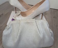 Red Dress with matching silver shoes and bag