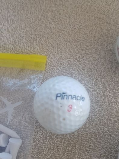 golf ball and tees