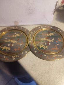 Set Of 2 Light Brass Safari Hanging Wall Plates.