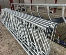 Sheep pen gates and feeding barriers