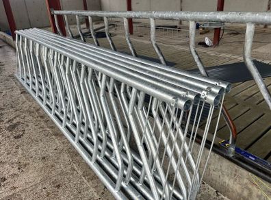 Sheep pen gates and feeding barriers