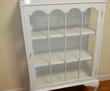 White display cabinet with glass door and shelves