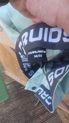 Druids sage colour golf jacket and trousers