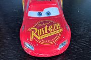 This toy is a Disney Pixar Cars Lightning McQueen die-cast vehicle from Mattel
