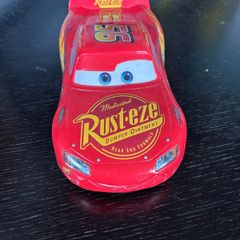 This toy is a Disney Pixar Cars Lightning McQueen die-cast vehicle from Mattel