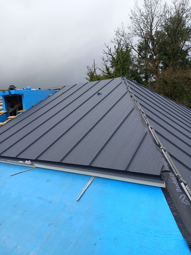 Standing seam roof, sale and delivery of roofing materials and gutter systems