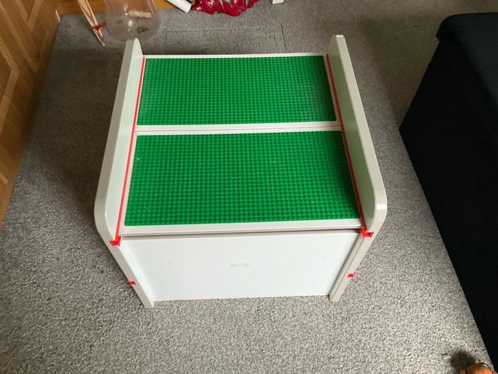 lego box and mixed lego pieces