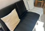 Sofa bed with cup holders