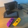 Nintendo Switch Console with Dock and Charger. Fully working, Purple and Orange joycons Image 2