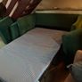 Green Velvet 2-Seater Sofa Bed with Pink Fringe Image 4