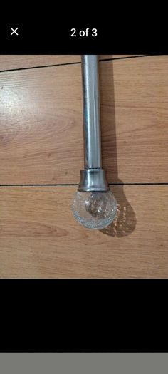 curtain pole, chrome and glass