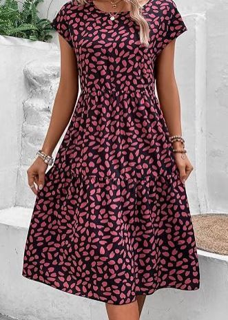 A-line tiered dress with red and black print.