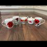 A Collection of Poppy Themed Ceramics Image 2