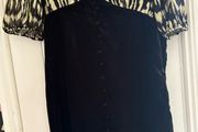 Black velvet dress, with gold shimmer bodice.