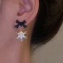 Black bow Christmas earrings Image 2