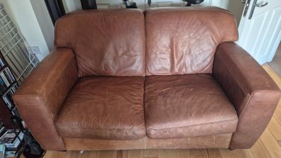 Two x 2 seater brown leather sofas for free