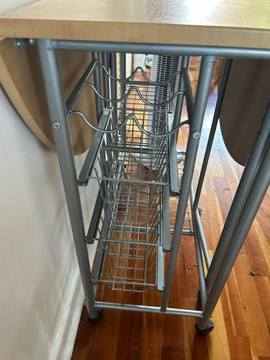 small kitchen table on wheels and with storage
