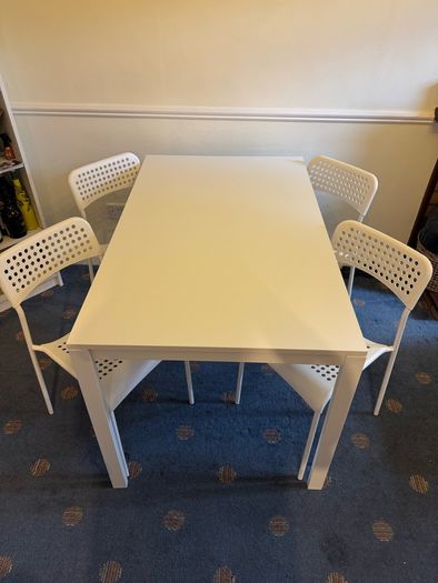 IKEA white dining table and chairs