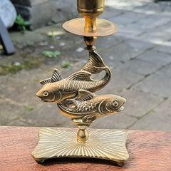 Brass fish candle stick