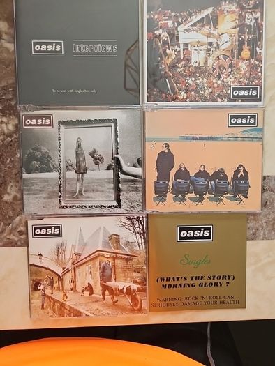 2 Oasis CD Singles Boxsets