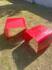 Two nesting designer glass tables