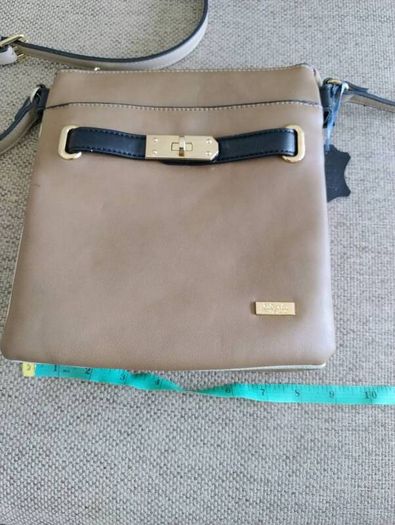 Liberty by Gionni genuine leather handbag in very good condition with lots of pockets zipped closures and adjustable shoulder strap one small mark see fourth last photo and see last three photos for exact measurements FREE TRACKED POSTAGE INCLUDED