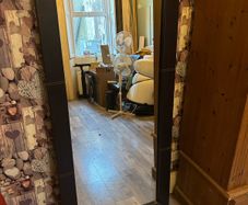 Leather bound standing mirror