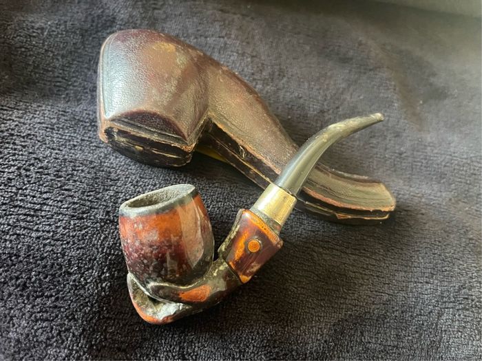 antique collection of clay  pipes