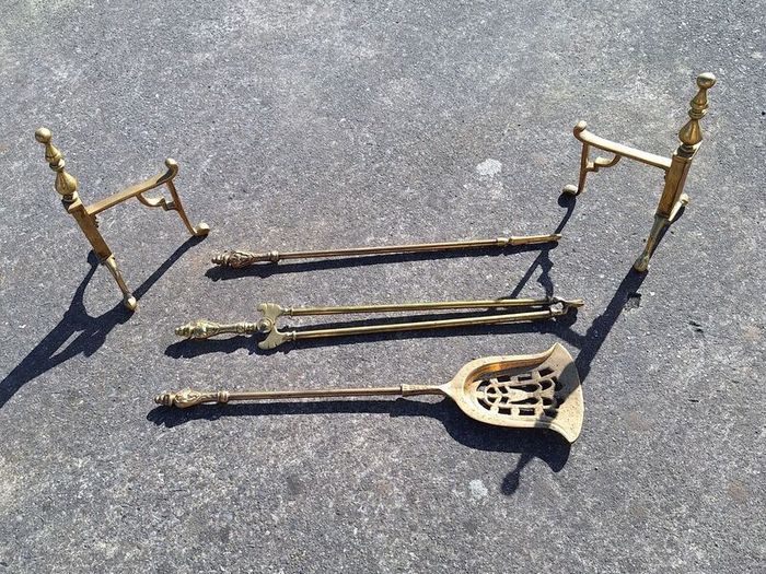 Vintage brass fire dogs and heavy companion set