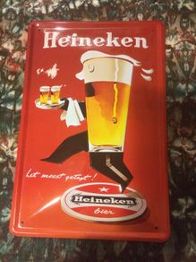 Official Heineken tin embossed sign free postage