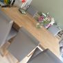 Beige Stone Dining Table & Grey Chairs Set Image 3